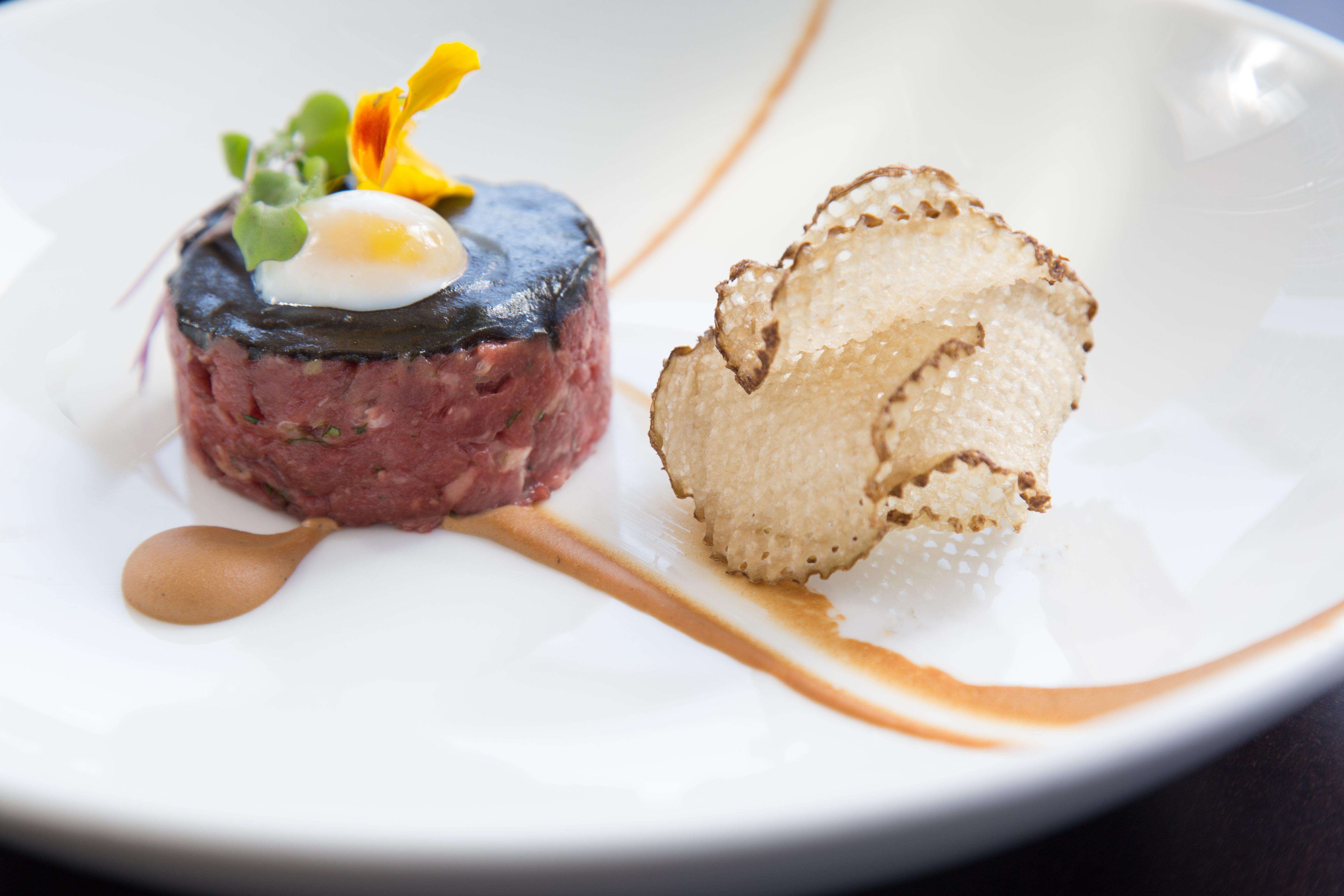 Kimpton Epic Hotel By Ihg Маямі Екстер'єр фото A dish of beef tartar with a slice of black truffle